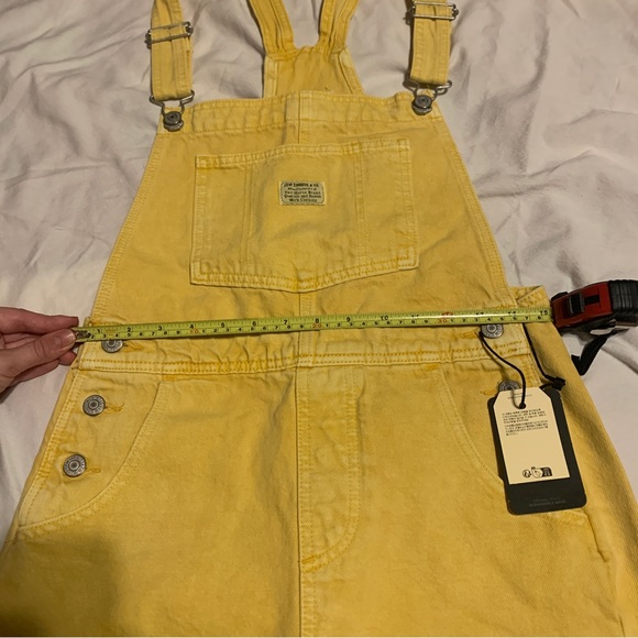 NWT Levi vintage Denim cutoff shortall overall bright yellow size small - Picture 7 of 12